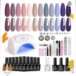 Brand new gel nail kit. Includes UV light and all items shown in photos.